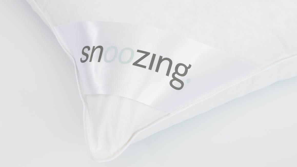 Snoozing Mont Ventoux oreiller duvet moelleux